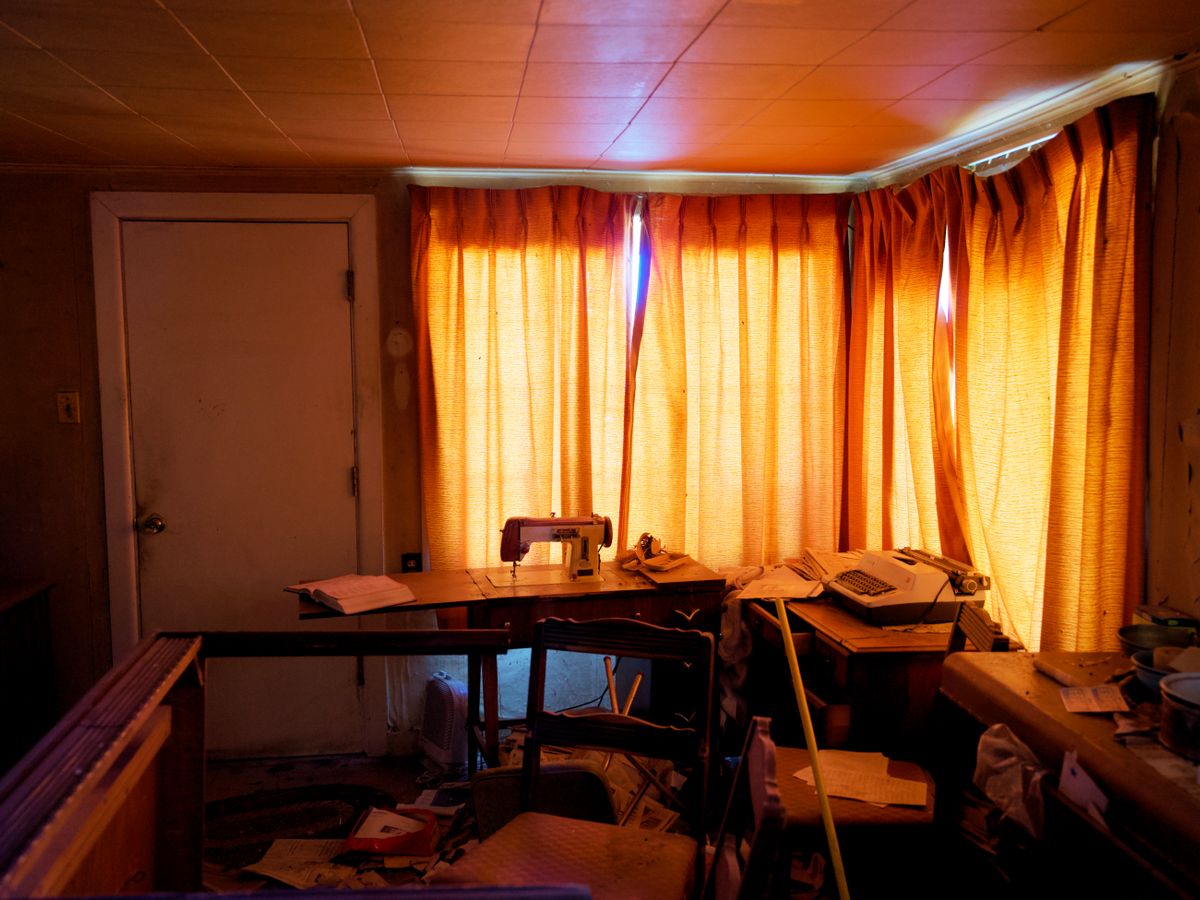 Lived-in apartment room before cleaning